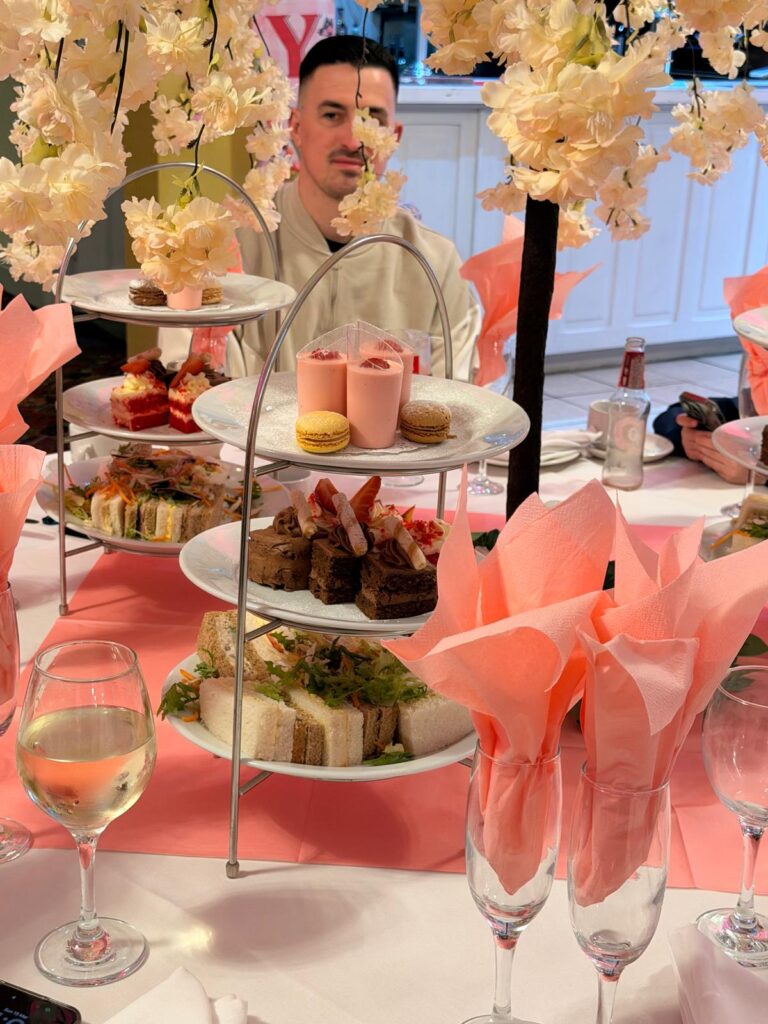 Afternoon tea stand with sandwiches, cakes and macarons for Mother's Day at The Elms Hotel Retford